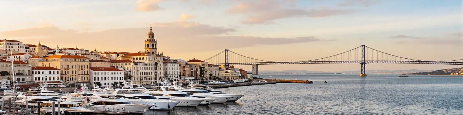 Lisbon Tagus waterfront with marina and bridge, yacht wine delivery in Portugal by Onshore Cellars